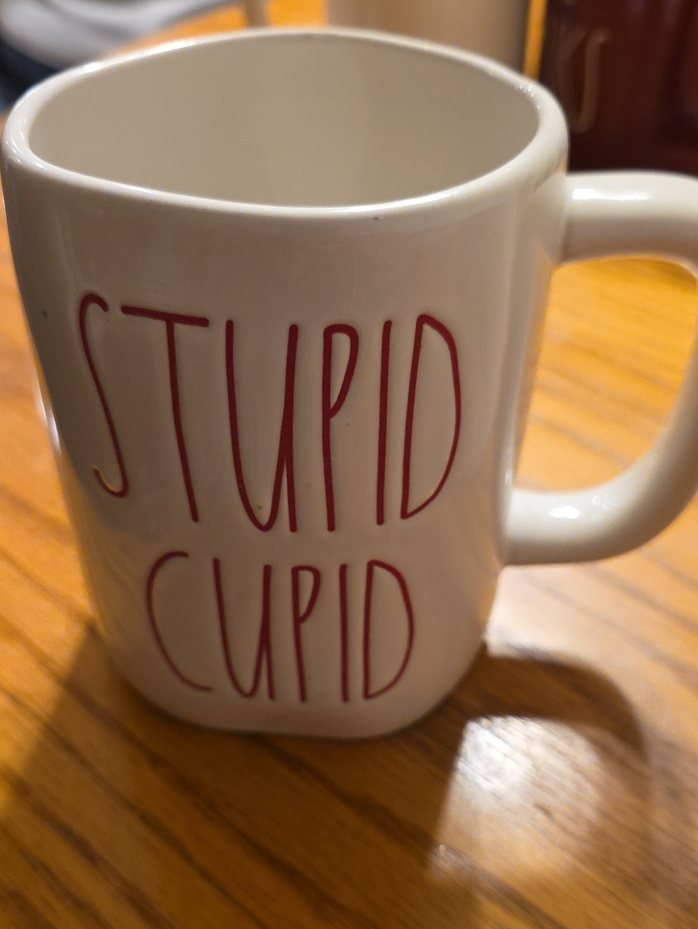 Rae Dunn. White 'Stupid Cupid' Ceramic Coffee Mug